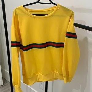 yellow sweatshirt